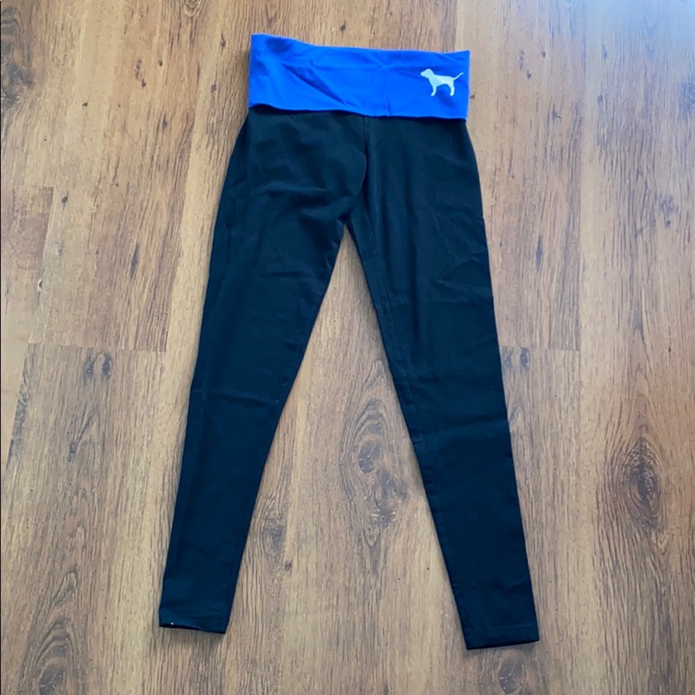 ‘PINK’ leggings with a royal blue band.
